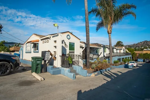 a view of a street with cars