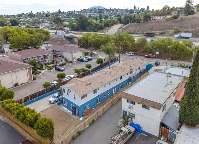 an aerial view of a house with a garden