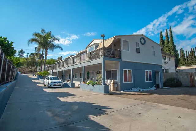 a front view of a building with street view
