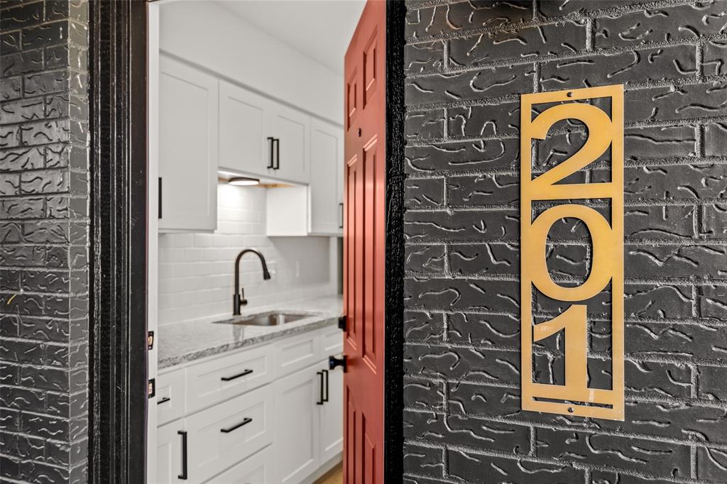 125 13th Street Southeast, Unit 201 Paris, TX 75460 - Photo 11 of 11 a bathroom with a sink and a mirror