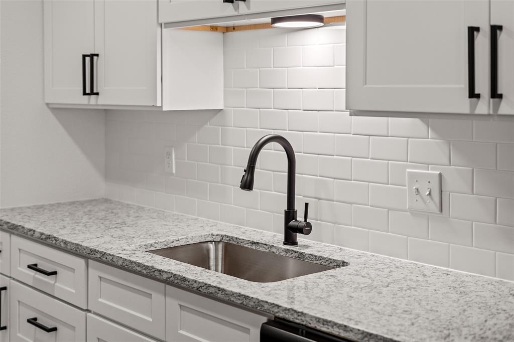 125 13th Street Southeast, Unit 201 Paris, TX 75460 - Photo 3 of 11 a close view of sink and tap