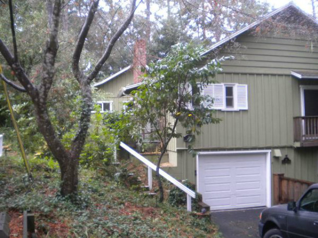 44 Ridge Way Mount Hermon, CA 95041 - Photo 1 of 12 a house that has a tree in front of the house