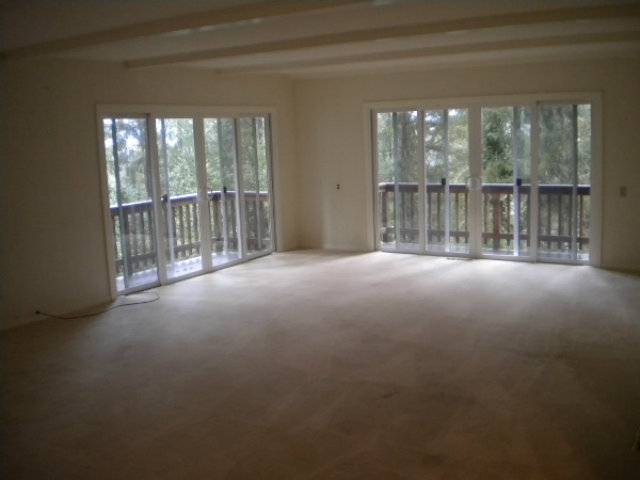 44 Ridge Way Mount Hermon, CA 95041 - Photo 8 of 12 a view of an empty room with wooden floor and a window