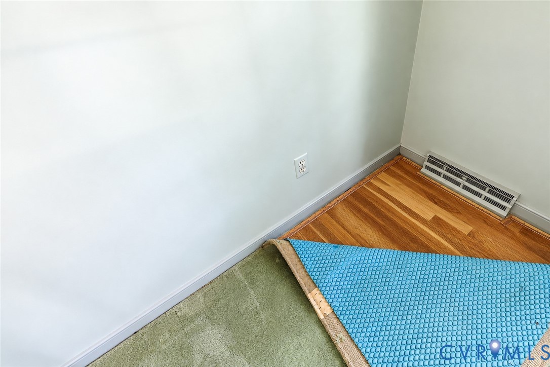 2725 Queenswood Road Midlothian, VA 23113 - Photo 4 of 17 Hardwood flooring underneath carpet.