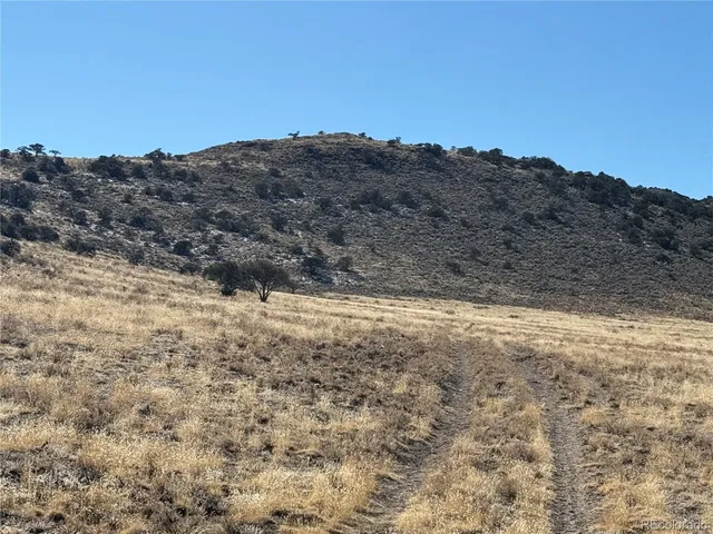 a view of mountain view with mountains in the background