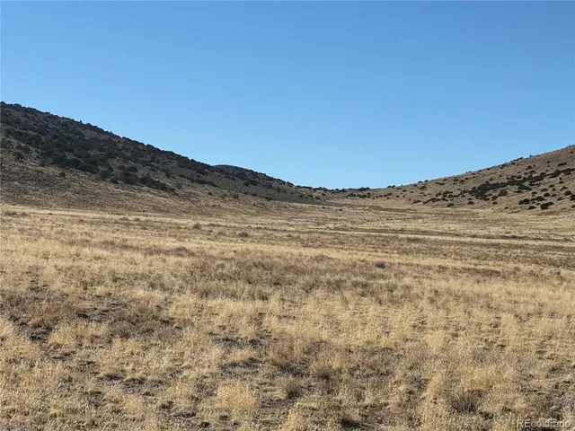 a view of ocean and a mountain