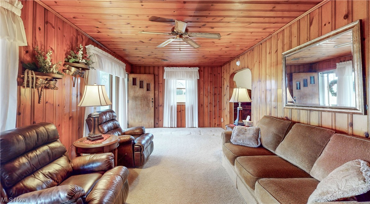 466 Pine Lake Road Sebring, OH 44672 - Photo 18 of 30 Living room with carpet, a wealth of natural light, and ceiling fan
