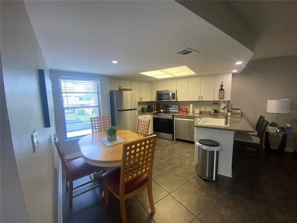 a view of a dining room with furniture