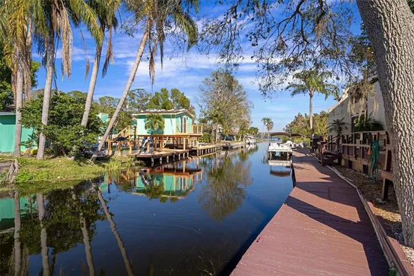 a view of a lake with sitting area