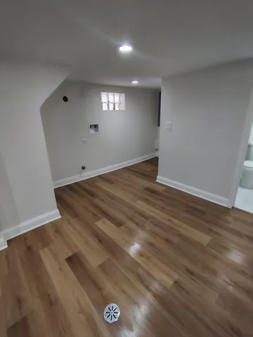 a view of room and wooden floor