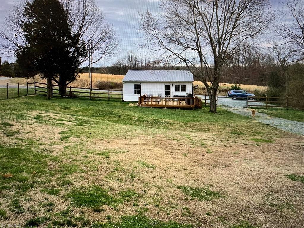 7741 Cedar Square Road Randleman, NC 27317 - Photo 4 of 18 View from the fence line in the back yard.