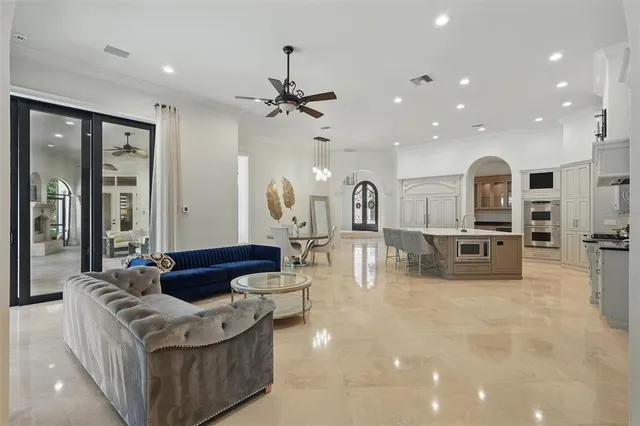 a living room with furniture and a table