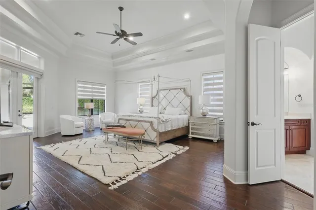 a bedroom with furniture and window