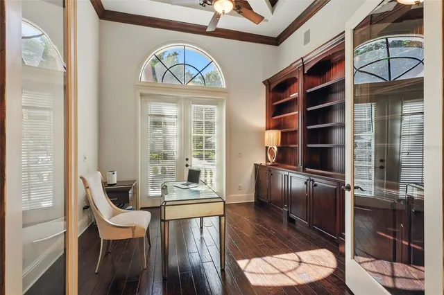 a bathroom with a granite countertop toilet a sink and shower
