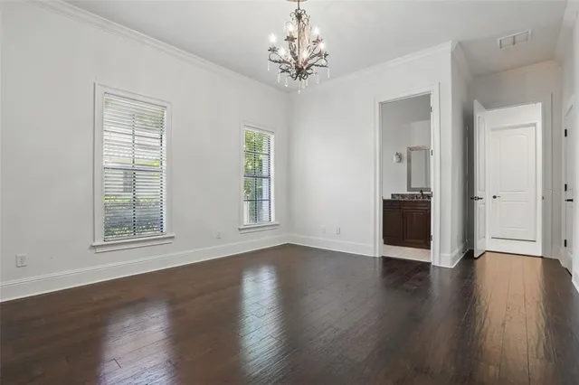 a view of hall way with furniture and fireplace