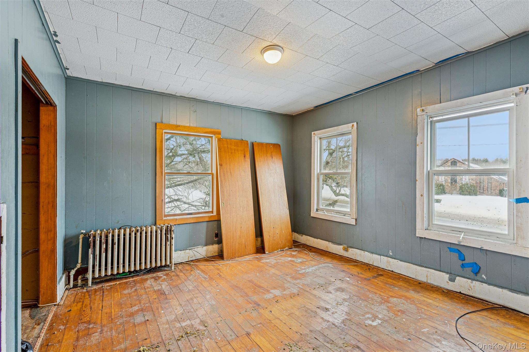 250 Main Road Riverhead, NY 11901 - Photo 22 of 31 a view of an empty room with a window and bathroom
