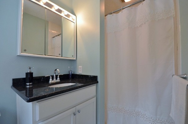 57 Green Road Bolton, MA 01740 - Photo 12 of 28 a close view of sink and cabinets