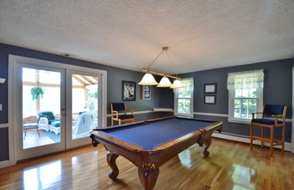 57 Green Road Bolton, MA 01740 - Photo 20 of 28 a room with furniture pool table wooden floor and windows