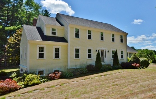 57 Green Road Bolton, MA 01740 - Photo 22 of 28 a front view of a house with a yard