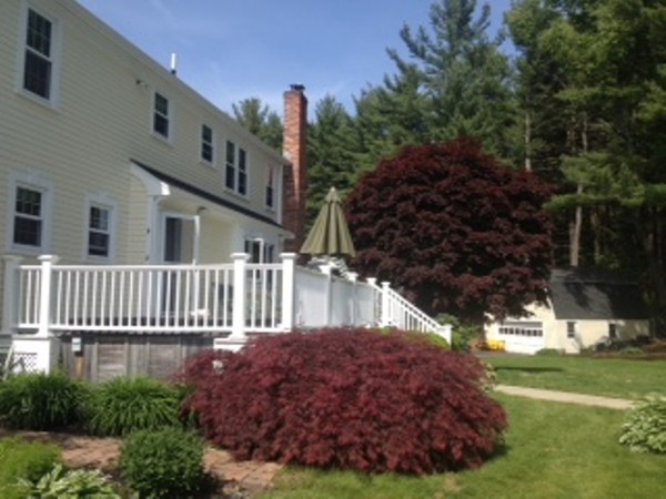 57 Green Road Bolton, MA 01740 - Photo 24 of 28 a view of a house with a yard