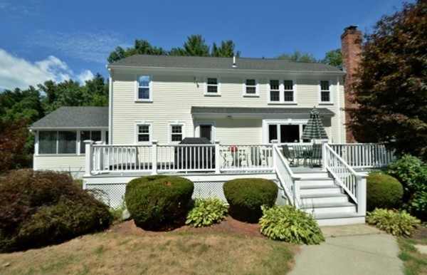 57 Green Road Bolton, MA 01740 - Photo 25 of 28 a front view of a house with a yard