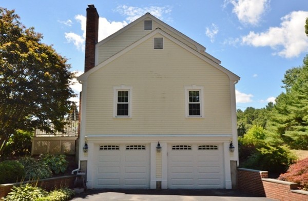 57 Green Road Bolton, MA 01740 - Photo 27 of 28 a front view of a house with garage