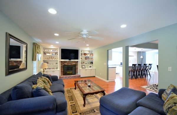 57 Green Road Bolton, MA 01740 - Photo 9 of 28 a living room with furniture and a flat screen tv