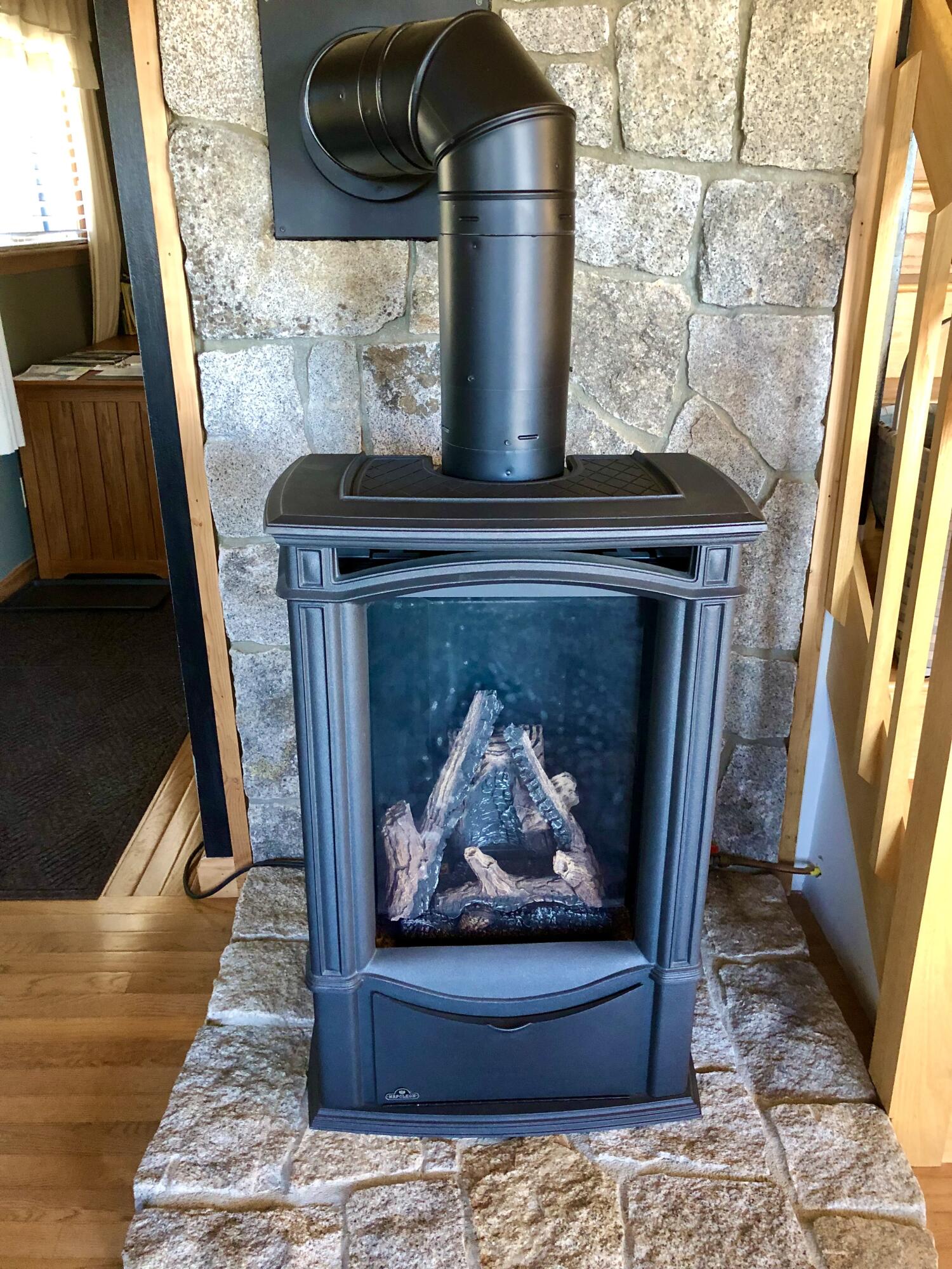 48 Granville Road Bass Harbor, ME 04653 - Photo 16 of 60 Gas stove in living room