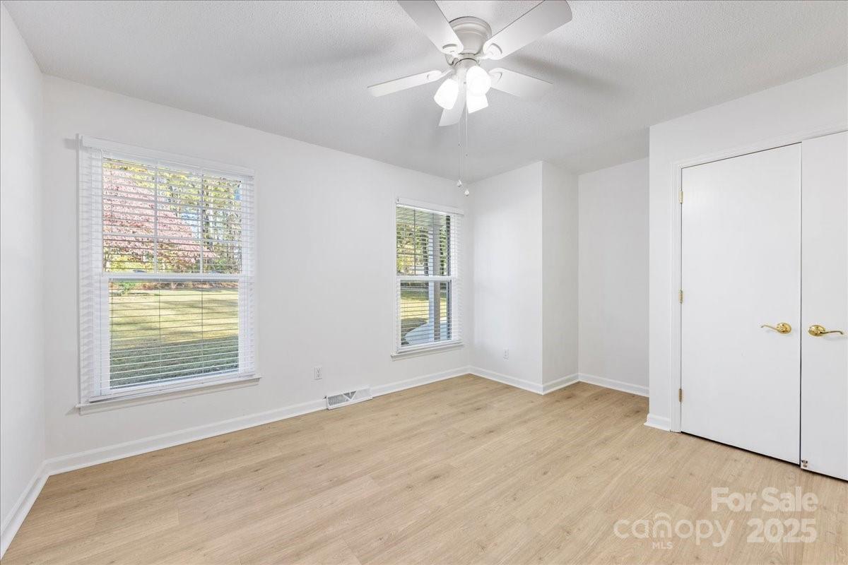 1840 Stoneyridge Drive Charlotte, NC 28214 - Photo 14 of 44 a view of an empty room with a window