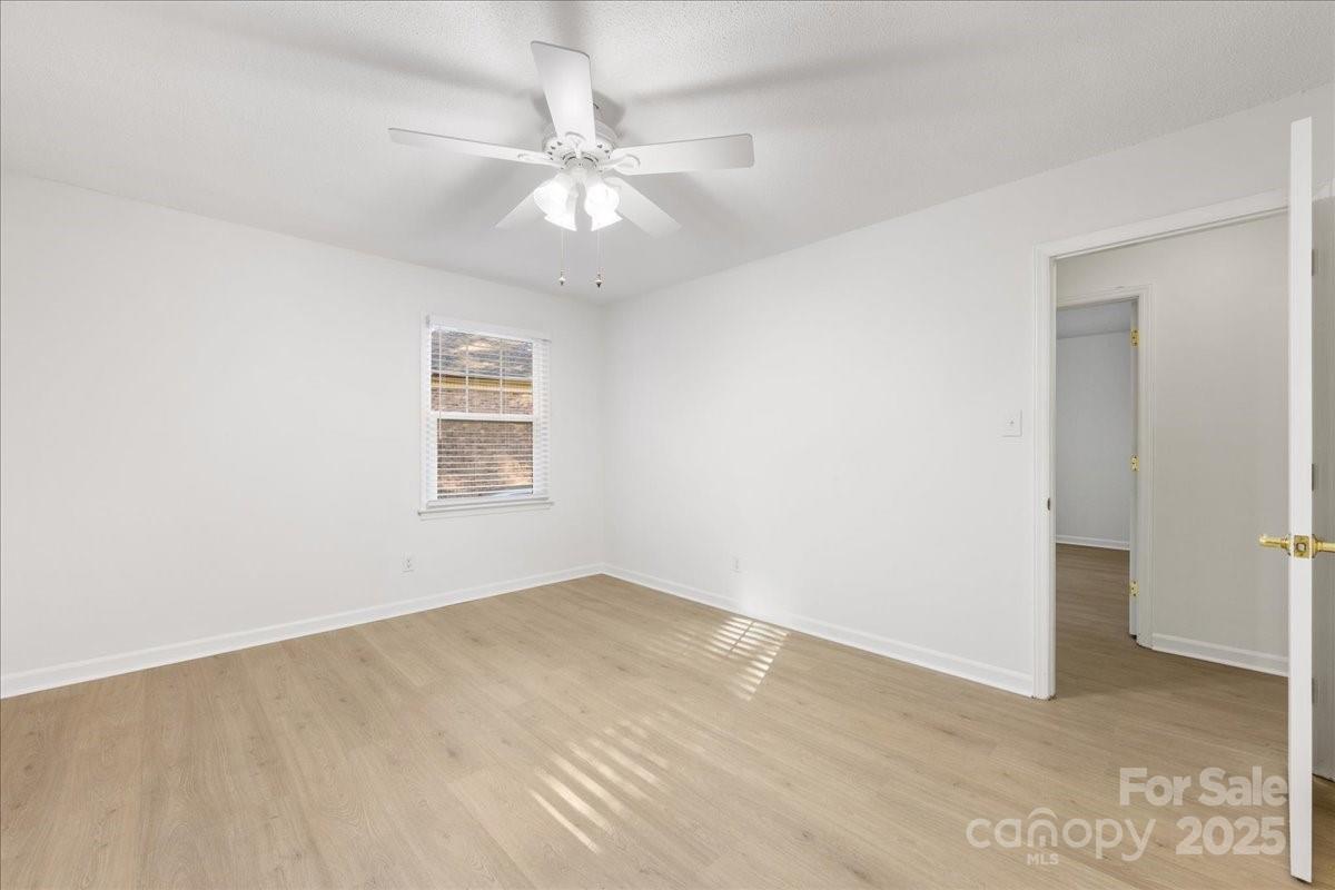 1840 Stoneyridge Drive Charlotte, NC 28214 - Photo 19 of 44 a view of an empty room with a window