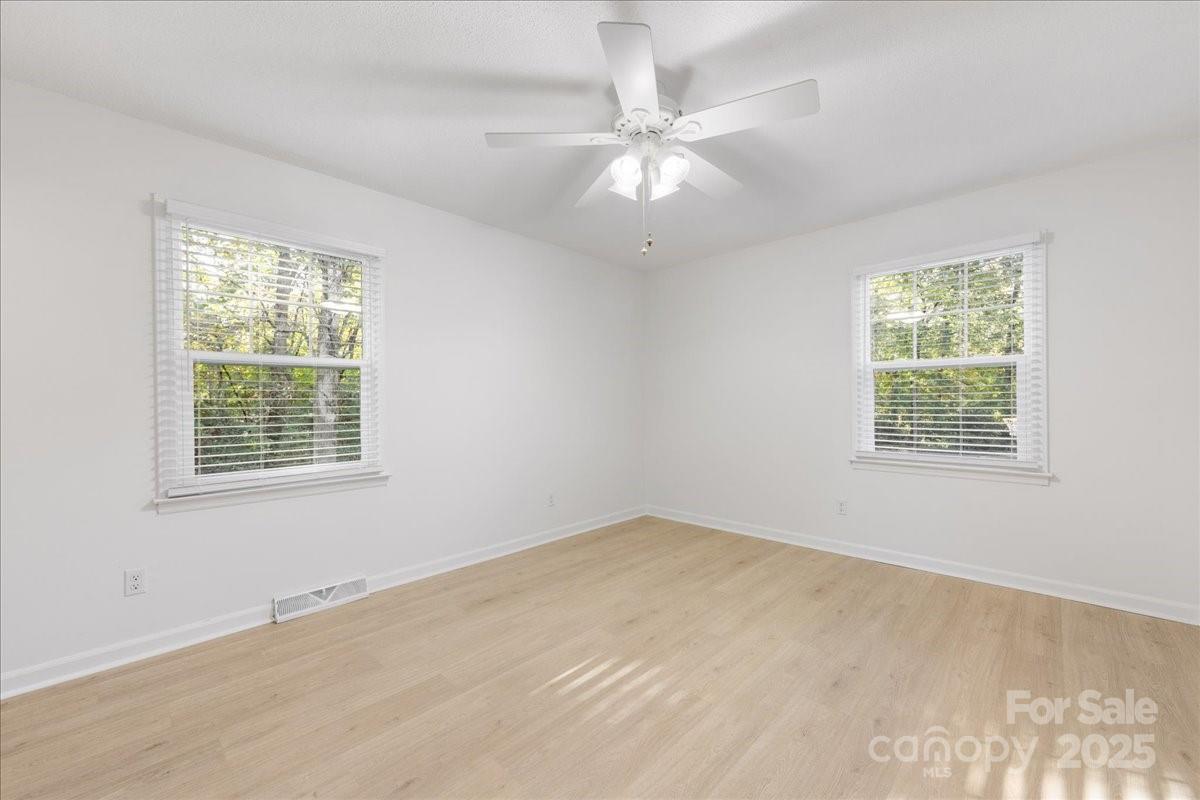 1840 Stoneyridge Drive Charlotte, NC 28214 - Photo 20 of 44 an empty room with a window