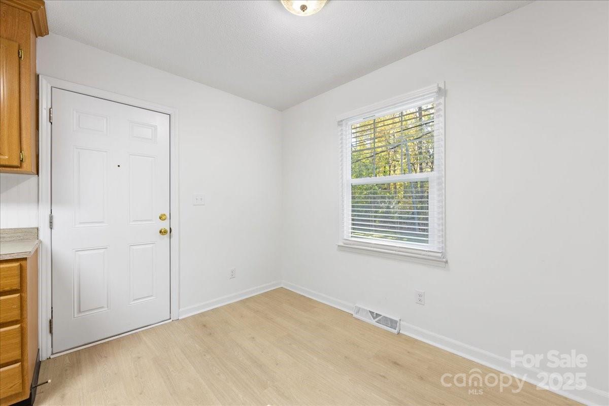 1840 Stoneyridge Drive Charlotte, NC 28214 - Photo 25 of 44 a view of an empty room with a window