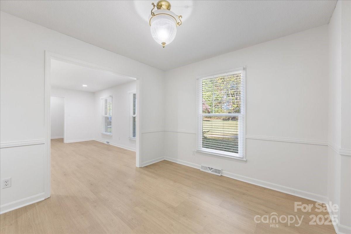 1840 Stoneyridge Drive Charlotte, NC 28214 - Photo 36 of 44 a view of an empty room with a window