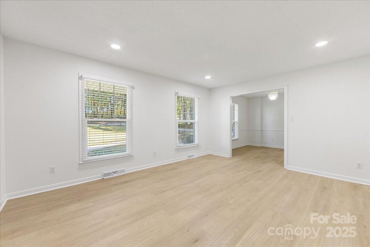 1840 Stoneyridge Drive Charlotte, NC 28214 - Photo 39 of 44 an empty room with windows