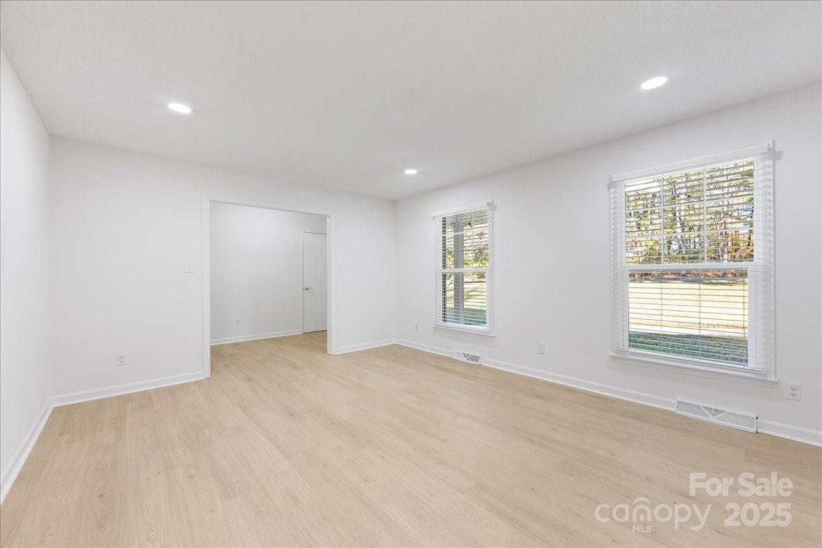 1840 Stoneyridge Drive Charlotte, NC 28214 - Photo 40 of 44 an empty room with windows