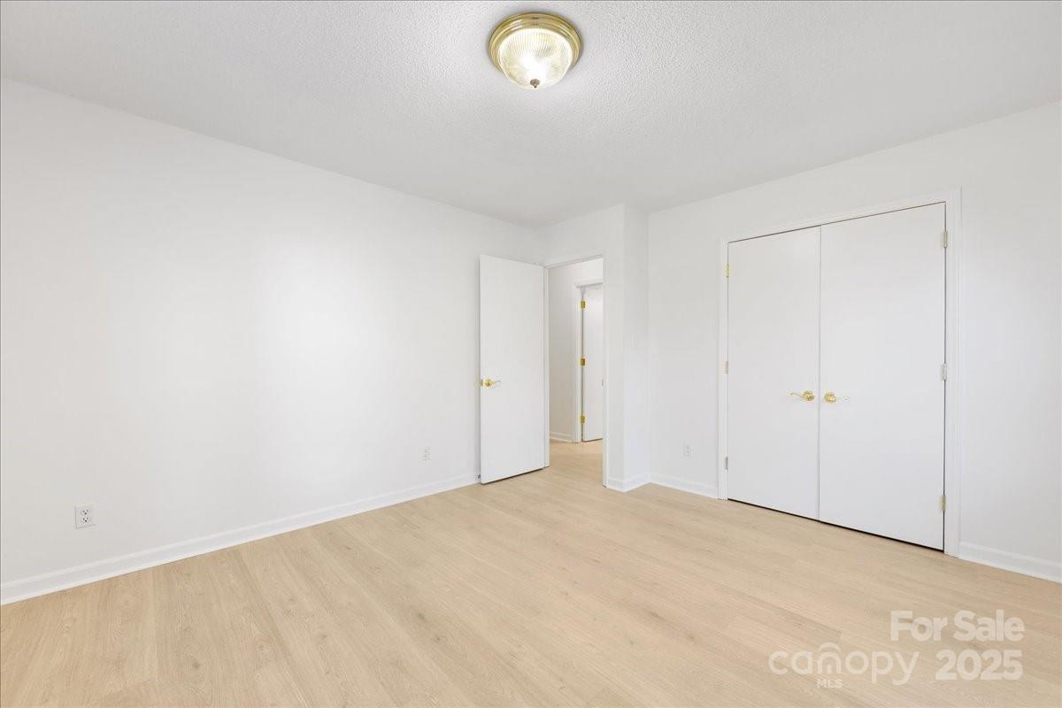 1840 Stoneyridge Drive Charlotte, NC 28214 - Photo 7 of 44 a view of an empty room