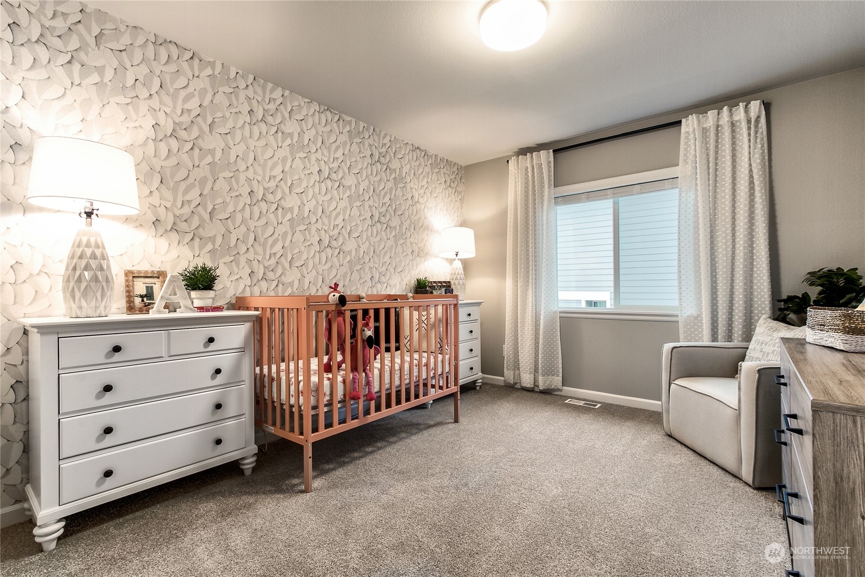 21116 42nd Drive Southeast, Unit 125 Bothell, WA 98021 - Photo 11 of 16 a bedroom with furniture and white walls