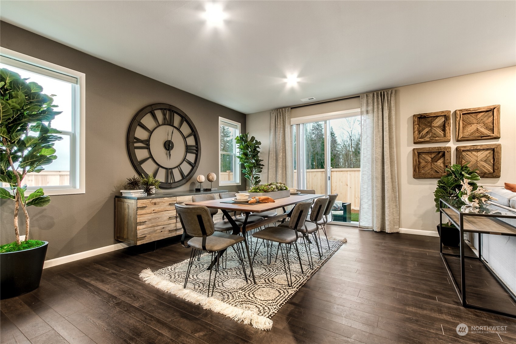 21116 42nd Drive Southeast, Unit 125 Bothell, WA 98021 - Photo 8 of 16 a dining room with furniture window and wooden floor