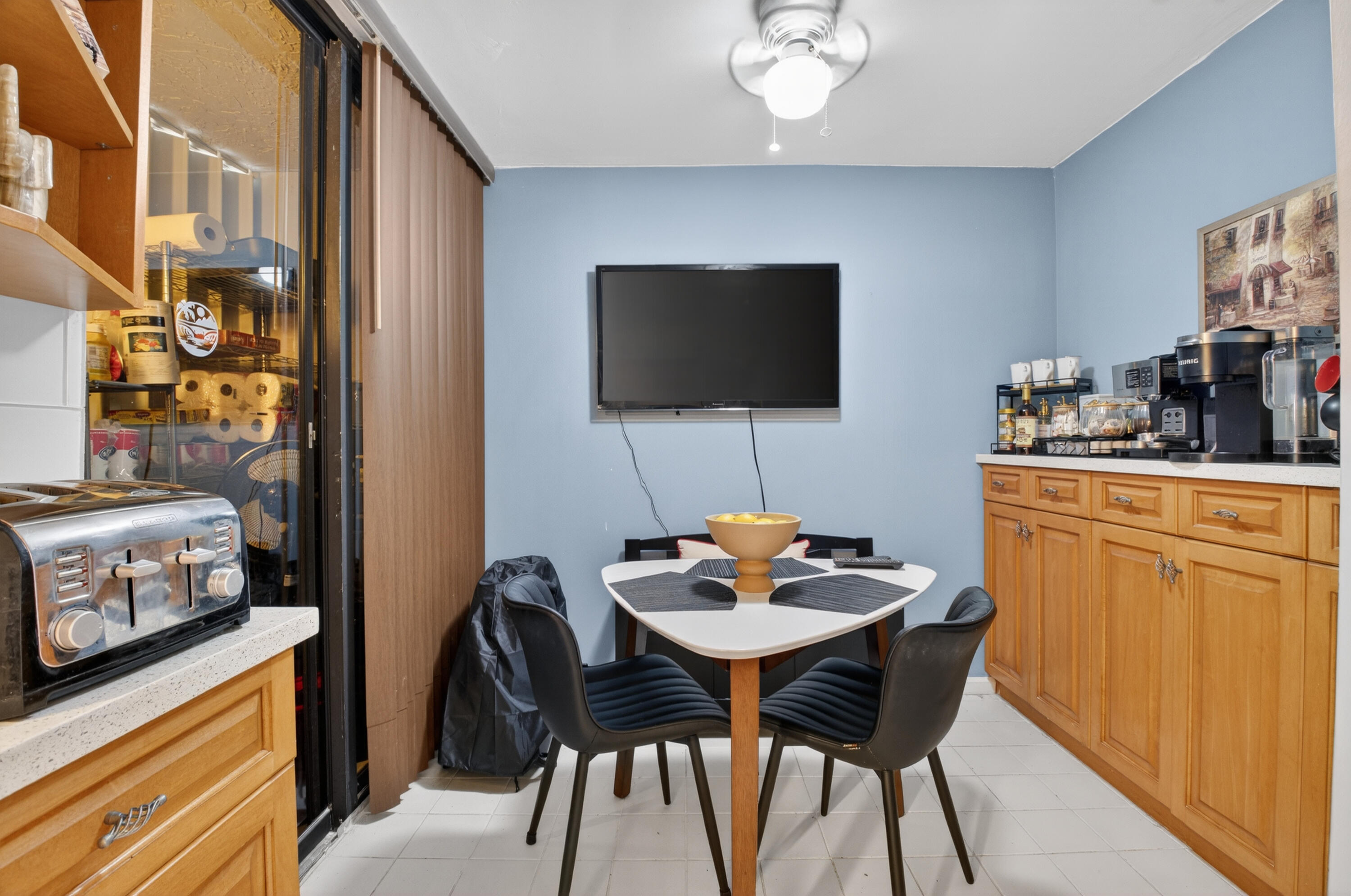 6372 La Costa Drive, Unit 705 Boca Raton, FL 33433 - Photo 16 of 60 a view of a dining room with furniture and wooden floor