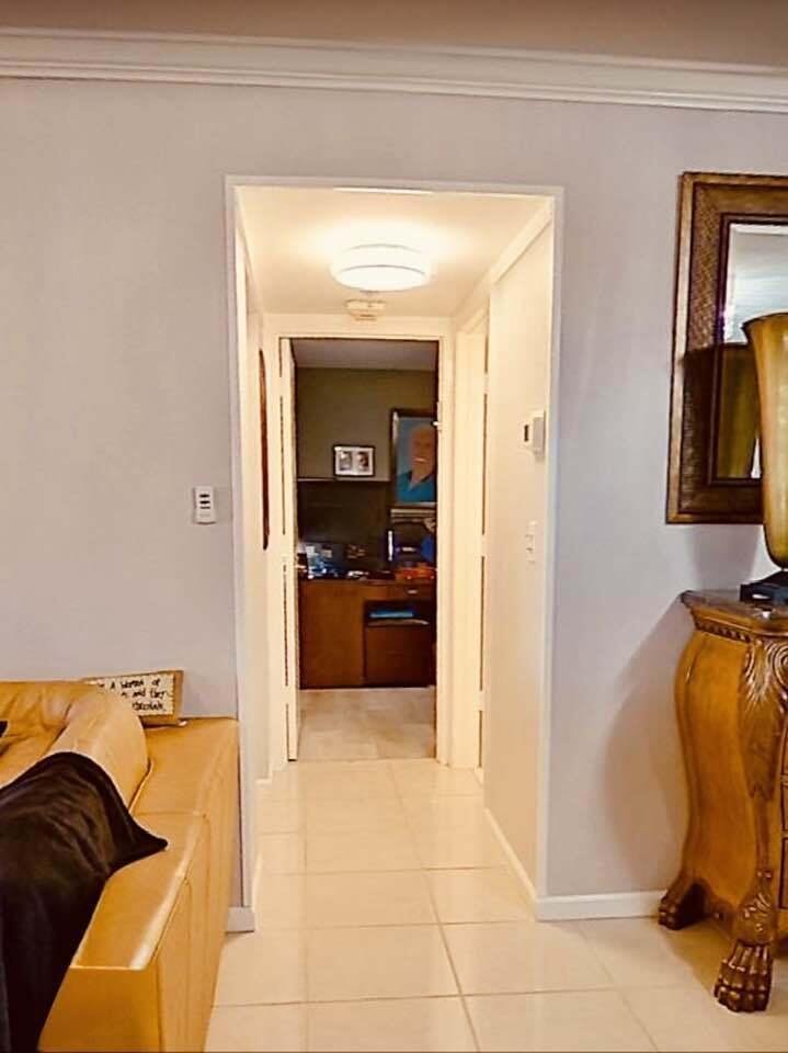 6372 La Costa Drive, Unit 705 Boca Raton, FL 33433 - Photo 21 of 60 a view of a living room and bathroom