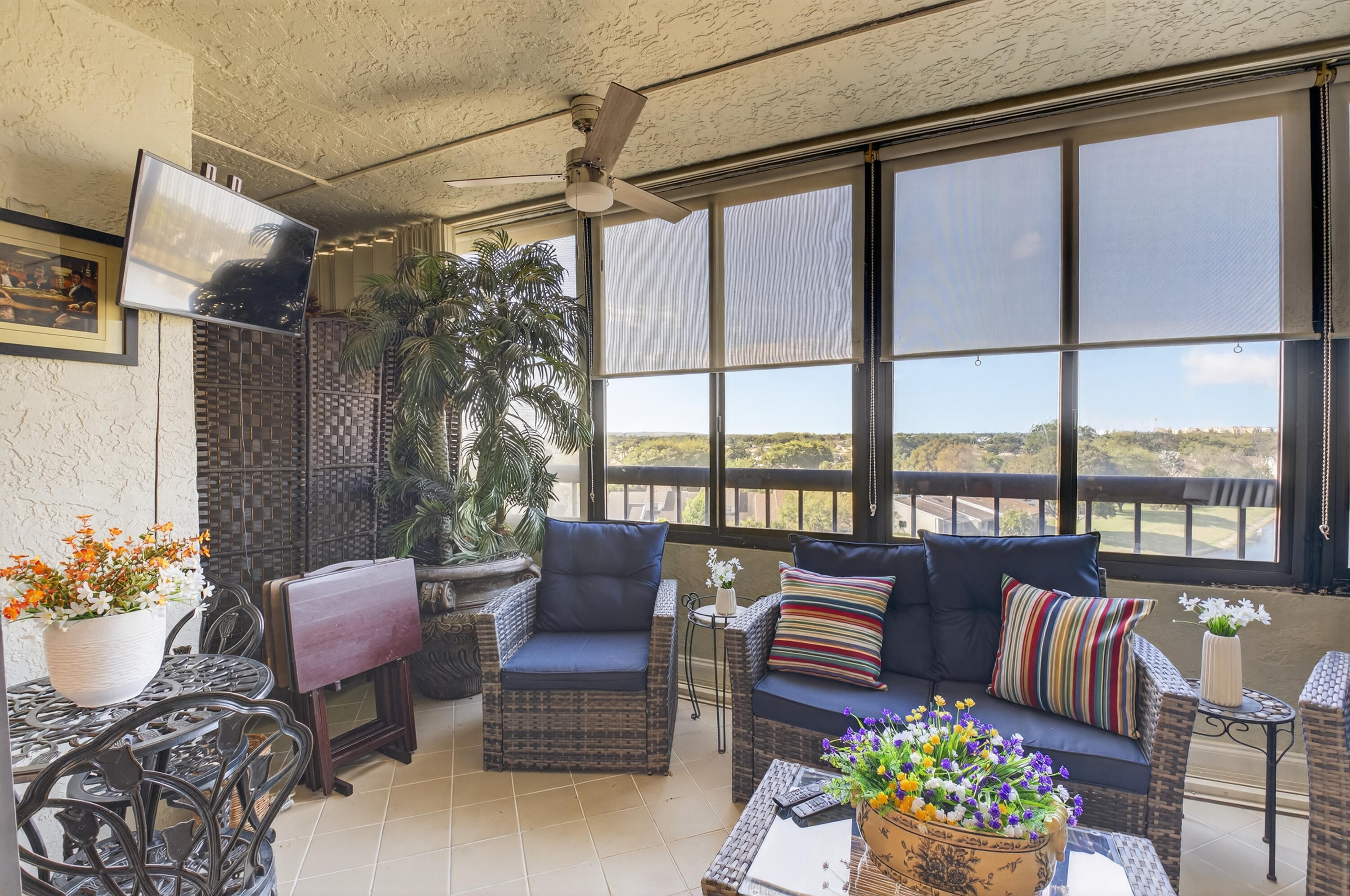6372 La Costa Drive, Unit 705 Boca Raton, FL 33433 - Photo 27 of 60 a living room with furniture and a large window