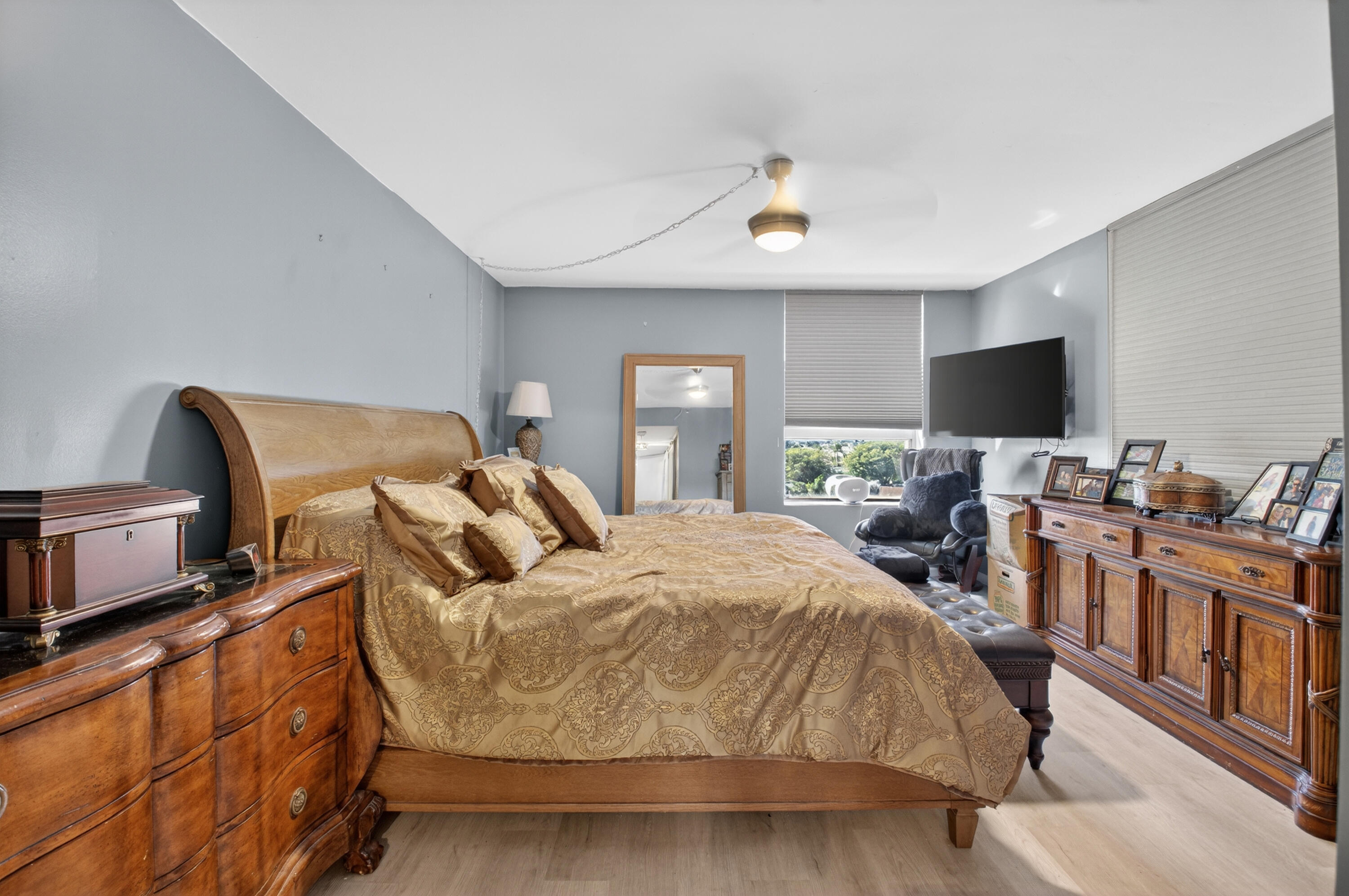 6372 La Costa Drive, Unit 705 Boca Raton, FL 33433 - Photo 31 of 60 a bedroom with a bed and flat screen tv