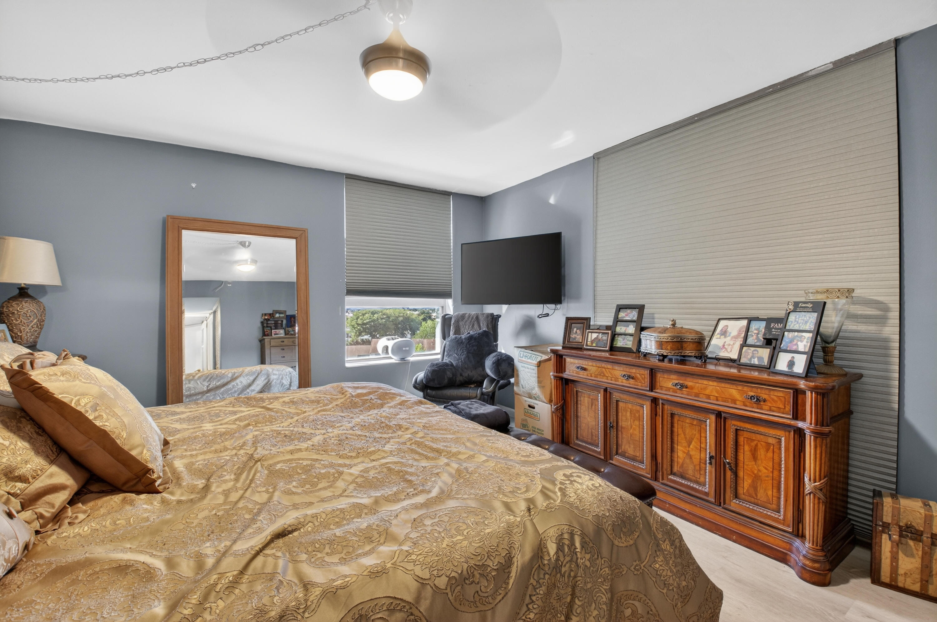 6372 La Costa Drive, Unit 705 Boca Raton, FL 33433 - Photo 32 of 60 a bedroom with a bed and a flat screen tv