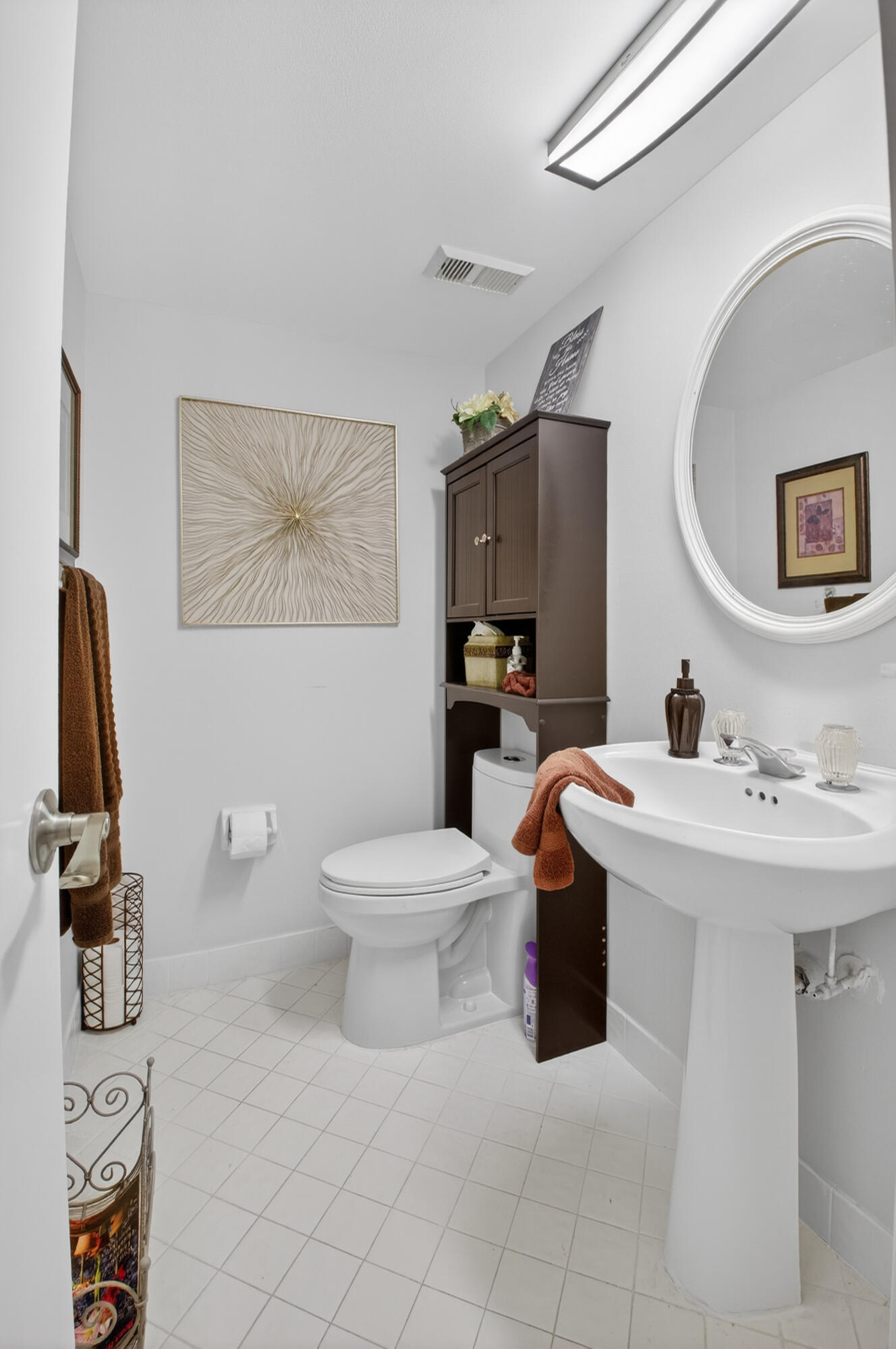 6372 La Costa Drive, Unit 705 Boca Raton, FL 33433 - Photo 38 of 60 a bathroom with a toilet sink and mirror