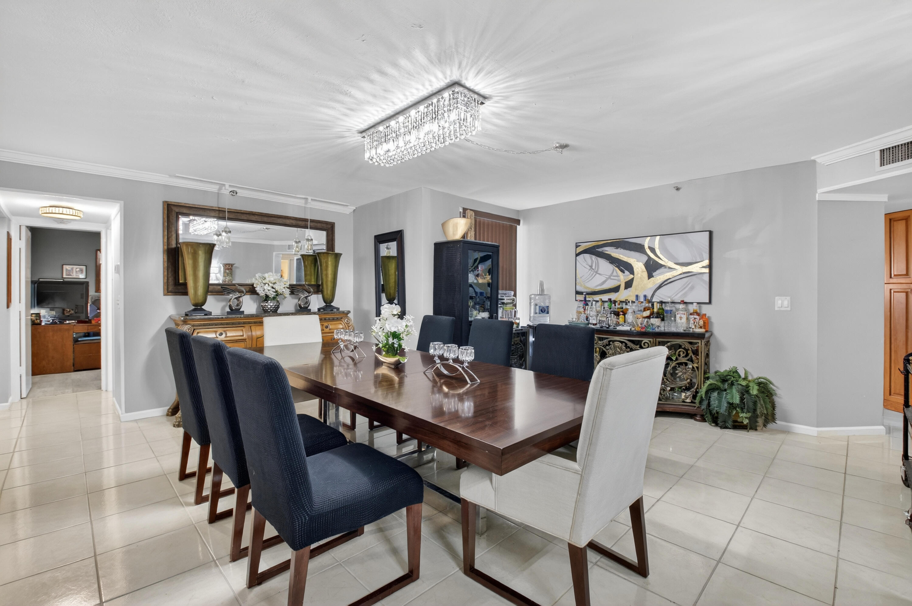 6372 La Costa Drive, Unit 705 Boca Raton, FL 33433 - Photo 4 of 60 a view of a dining room with furniture