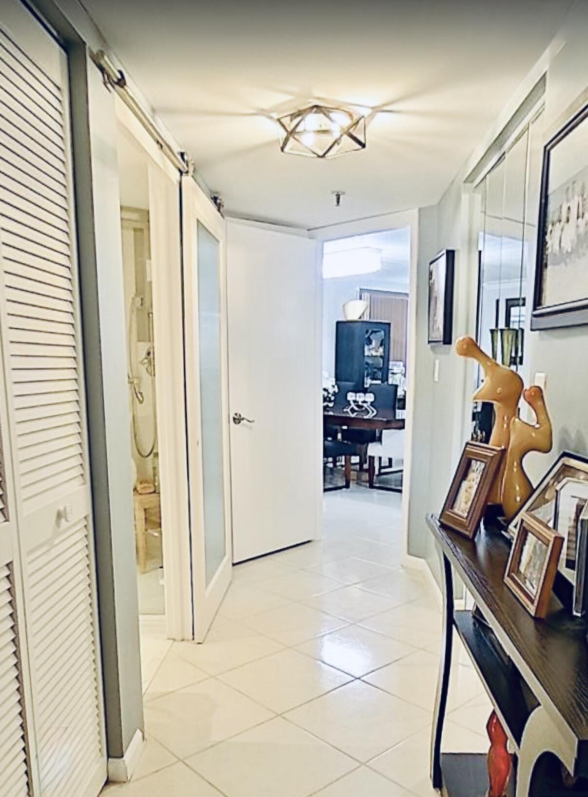 6372 La Costa Drive, Unit 705 Boca Raton, FL 33433 - Photo 45 of 60 a view of a room with gym equipment