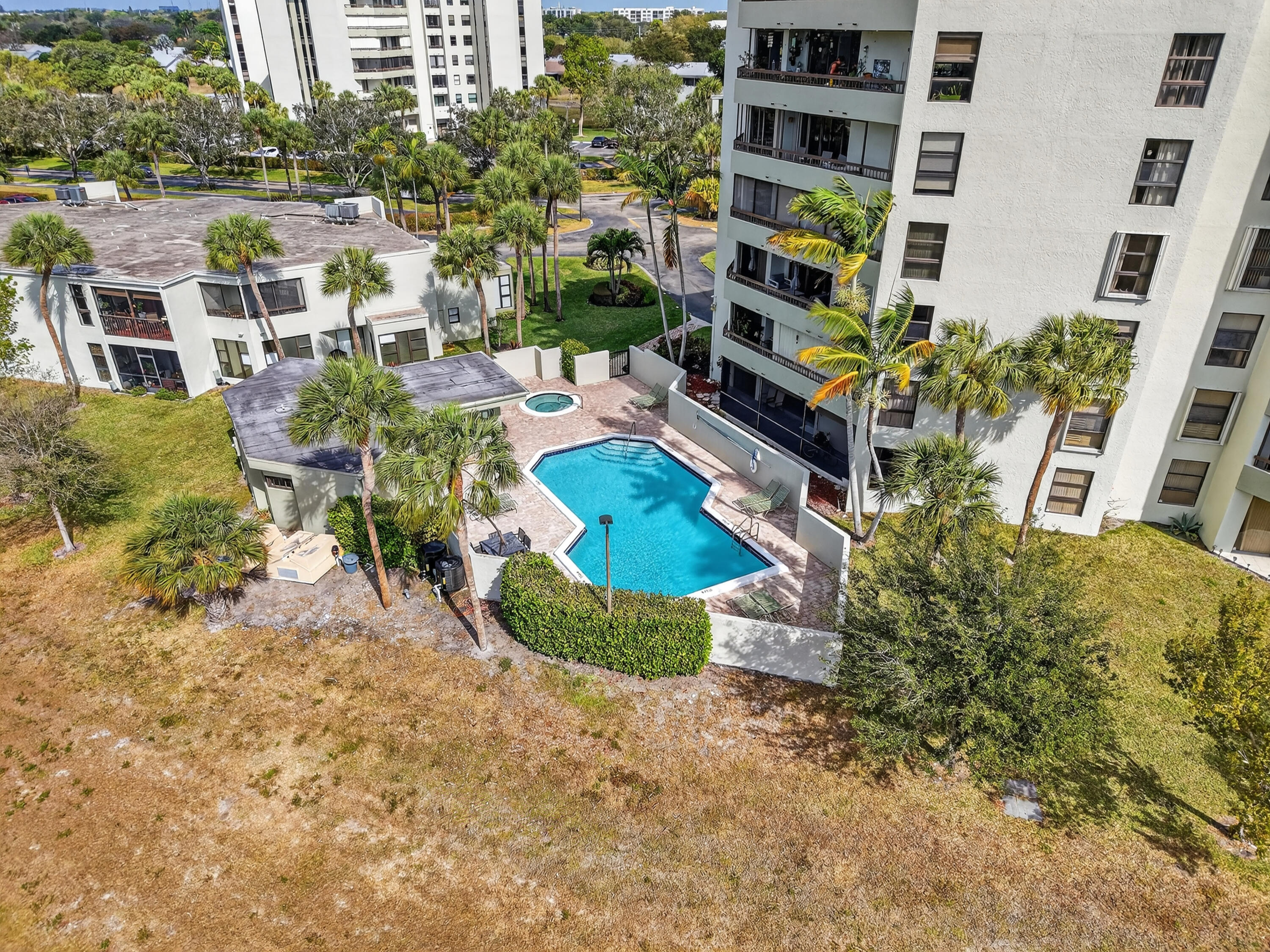 6372 La Costa Drive, Unit 705 Boca Raton, FL 33433 - Photo 49 of 60 a view of multiple houses with outdoor space