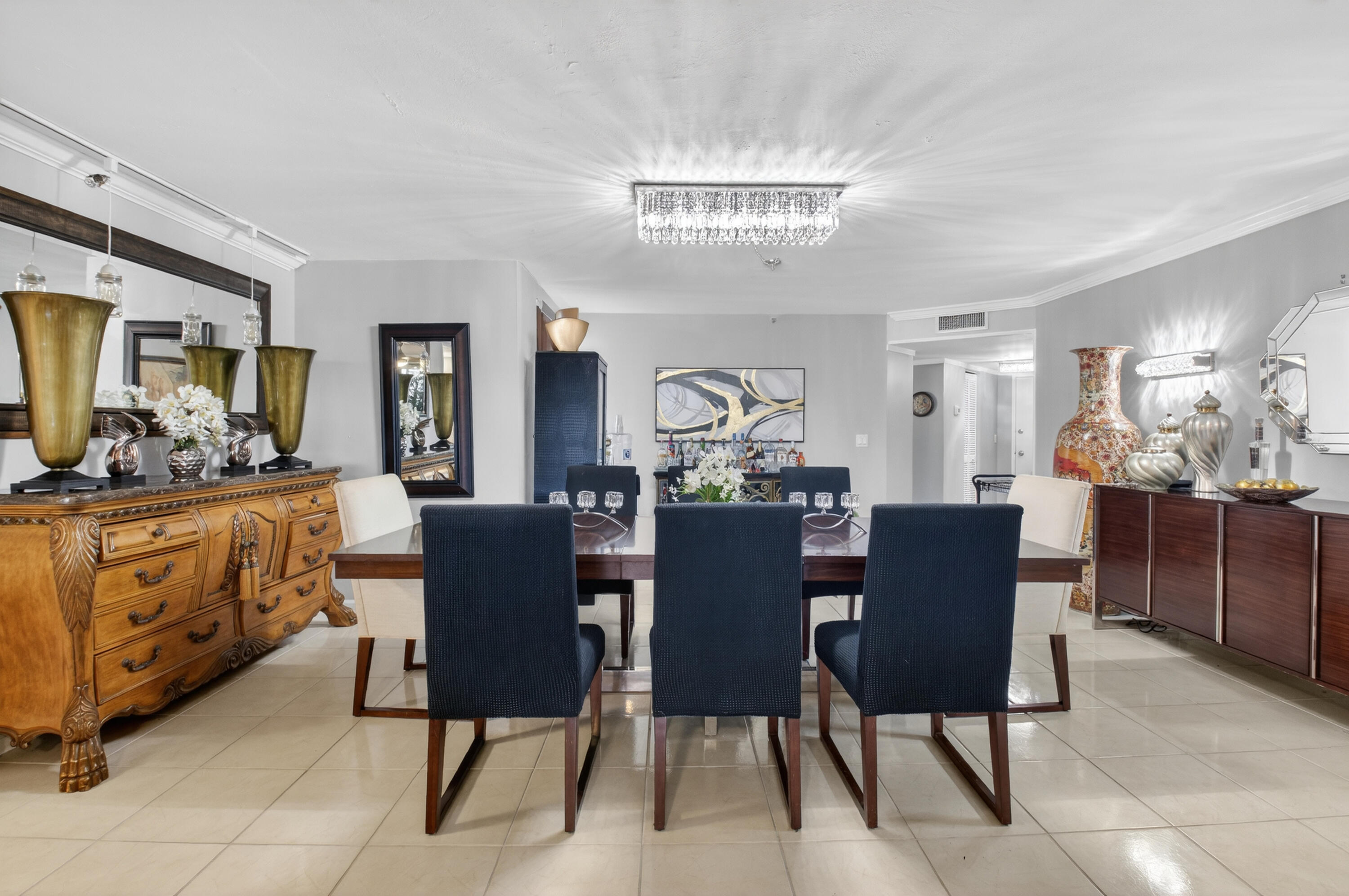 6372 La Costa Drive, Unit 705 Boca Raton, FL 33433 - Photo 7 of 60 a view of a dining room with furniture