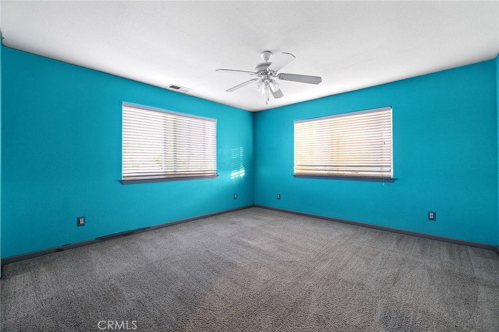 4 La Palma Drive Oroville, CA 95965 - Photo 20 of 39 a view of an empty room with window and ceiling fan