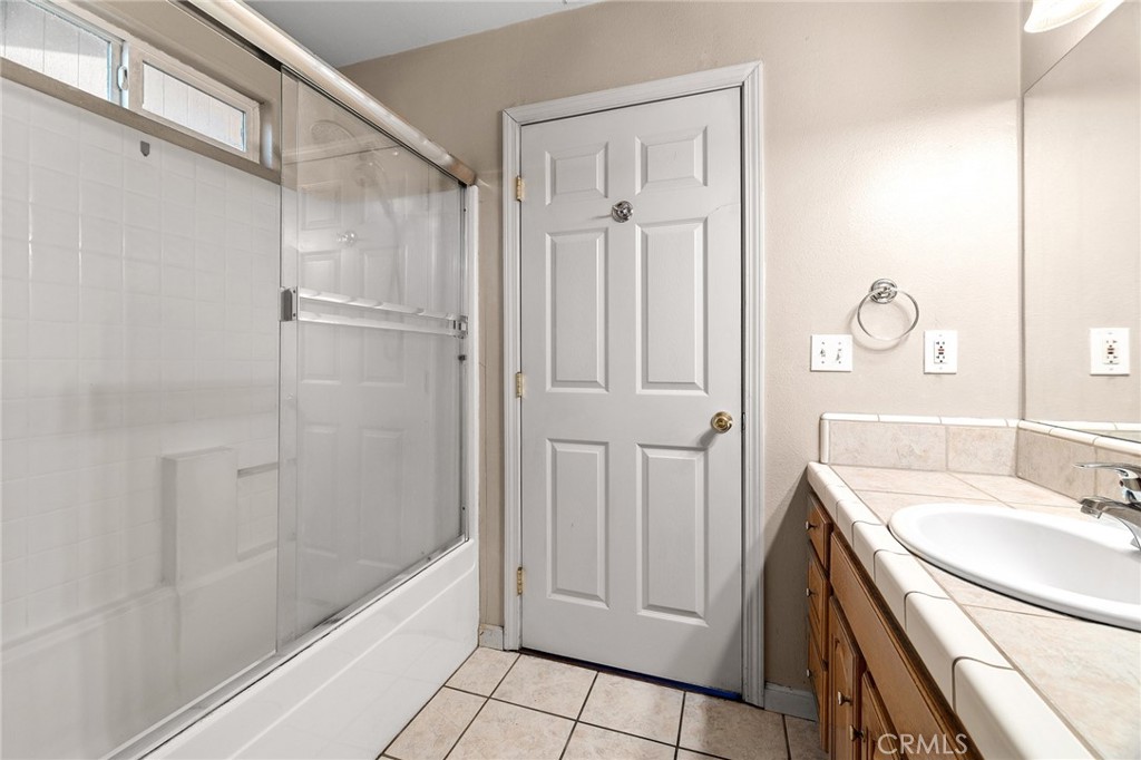 4 La Palma Drive Oroville, CA 95965 - Photo 25 of 39 a bathroom with a sink and a mirror with bathtub